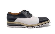 Leather Spectator Lace-Up Oxford Black/White Gorgeous lace-up Oxford from the Carrucci Collection in Smooth leather features a Cap-Toe, Double Stitched welt and a Tri Color Lightweight Rubber Sole! White Wingtip Lace-up Shoes For Work, White Brogue Lace-up Shoes For Derby, White Brogue Lace-up Shoes For Work, White Lace-up Oxfords For Office, White Cap Toe Oxfords For Spring, White Leather Sole Lace-up Shoes For Work, White Lace-up Shoes With Rubber Sole For Derby, White Leather Lace-up Shoes For Office, White Lace-up Work Shoes With Leather Sole