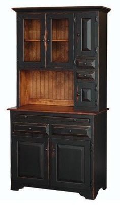 an old black china cabinet with wooden doors and drawers on the front, side view