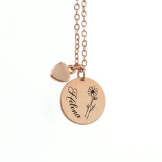 Treat her to a stylish and meaningful gift with our beautiful Personalised Birth Flower Brushed Heart and Disc Necklace. With its unique design, this necklace is perfect for any occasion. Whether you gift it to your mum this Mother’s Day, your girlfriend on Valentine’s or treat a loved one on their birthday, this outstanding piece of women’s jewellery will make the perfect gift for her. Personalise with your loved one’s name and their birth flower - both will be meticulously engraved onto the pendant by our personalisation exports - creating a truly one-of-a-kind gift that will hold real sentimental value to her. Alongside this will be a cute little heart pendant, representing your love - she’ll forever hold it close to her heart. Your necklace will come beautifully nestled inside in a sle Personalized Rose Gold Heart Necklace For Her, Mother's Day Jewelry With Heart Charm And Flower Shape, Mother's Day Flower Jewelry With Heart Charm, Mother's Day Flower Shaped Jewelry With Heart Charm, Birth Flower Necklace For Her, Mother's Day Anniversary Flower Pendant Necklace, Rose Gold Charm Necklace Gift For Mom, Mother's Day Flower Pendant Necklace Gift For Mom, Mother's Day Flower Necklace Gift For Mom