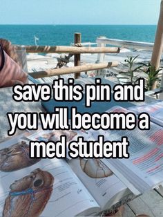 an open book sitting on top of a wooden table next to the ocean with text that reads, save this pin and you will become a med student