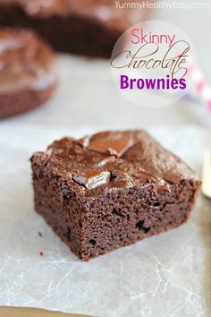 chocolate brownies are sitting on top of parchment paper