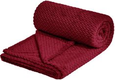 a red blanket folded on top of each other