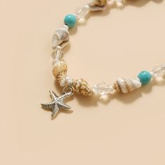 Product Overview Embrace the spirit of summer and enhance your beach attire with our Charming Starfish and Green Stone Beaded Anklet. Perfect for women who love to express their style effortlessly, this anklet combines elegance and playful charm in one beautiful accessory. Whether you're lounging by the sea or dancing at a beach party, this anklet adds a touch of glamour to any outfit. Key Features Material: High-quality zinc alloy that's both durable and lightweight. Design: Adorned with a capt Starfish Anklets, Beaded Starfish, Beaded Anklet, Beach Anklets, Beach Attire, Bohemian Handmade, Women Beach, Five Pointed Star, Beaded Anklets