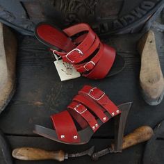 Woman Clogs with high heel in natural wood and Real Leather , handmade by Mario Doni. Woman Clogs Model: Lucrezia Clogs color: Dark brown Heel: 100 mm Upper: Genuine leather Vegetable Color: red * On request also available in other colors Sabot made of wood in the best tradition of craftsmanship Tuscany. Uppers made of genuine leather Vegetable-available in a wide selection of colors to give joy to your Summer All our products are made exclusively to order, please contact me for further editing. Leather High Heel Mules With Wooden Heel, Leather High Heel Clogs With Deep Heel Cup, Wooden Platform Clogs With Round Toe, Leather Clogs With 4-inch Block Heel, Closed Toe Mules With Wooden Heel, Leather High Heel Clogs With Stacked Heel, Red High Heel Mules With Wooden Heel, Wooden Clogs With Stacked Heel And Closed Toe, Wooden Closed Toe Clogs With Stacked Heel