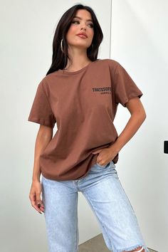 You cant go wrong with the Series 6 Tee! A basic, oversized must have! Featuring short sleeves, a round neckline, a 'THATSSOFETCH' logo on the front and back and a relaxed fit. Pair her with bike shorts and some white sneakers for an effortlessly cute look! FABRICATION: 60% Polyester / 40% Cotton SIZING: Crystal's height is 162cm and wears a size AU6/US2 Brown Tshirt Outfit, Crop Outerwear, Orange Swimwear, Green Swimwear, Summer Formal Dresses, Red Swimwear, Tshirt Outfit, Lounge Sweater, White Swimwear