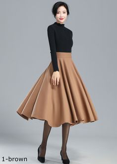 "DETAILS: * 30% wool, 30% fiber, 40% polyester * fully satiny liner * Two side pockets * back zip closure * pleated skirt, circle skirt * High waist skirt * Perfect for Winter, autumn * Lean More about the items From the FAQs on the page bottom * The model is 170 cm (5′ 7″) tall with a 80 cm (31.5\") bust, 66 cm (26\") waist. She is wearing the brown wool skirt in size XS. CUSTOM MADE SERVICE If you * Change other color * Can't find your size in our size Chart * Change the Style * Change the length * Your Height is not Between 5'1\" - 5\"9\" * Your weight is not Between 47 kg - 75kg I can do it for you, It will need some extra fee depending on on your need. Contact with me for more detail. SIZE GUIDE Size vary between Brand and Country Please get your body measurement with our Size Guide A Circle Skirt Outfits, Long Wool Skirt, Skirt Circle, Wool Midi Skirt, Below The Knee Skirt, Skirt Wool, Long Skirt Outfits, Winter Skirt Outfit, Houndstooth Skirt