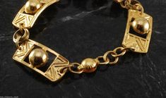 "For sale is a vintage ladies bracelet. This bracelet is from 1940's or 50's era. The bracelet is gold tone and I am pretty sure they are brass metal. The center has a ball decorating it. Please note the bracelets are antique and have some blemishes and imperfections. The bracelet measures 5/8\" x 7\". New treasures added all the time, check back often!" Straw Placemats, Ladies Bracelet, Metal Fish, Antique Bracelets, Metal Ball, Brass Jewelry, Wedding Bracelet, Brass Metal, Hair Barrettes