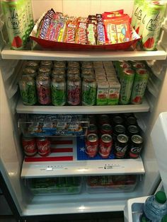 an open refrigerator filled with drinks and snacks