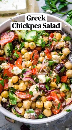 greek chickpea salad in a white bowl