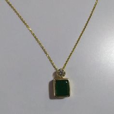 ❤ Kween Gems is an Exclusive Trendy Jewelry Collection for any occasion of Wedding, Engagement, Valentines Day, Anniversary, etc. ✔ Material : 14K Yellow Gold Solid ✔ Main Stone : Natural Emerald (AAA quality ) ✔ Secondary Stone : Moissanite ( GRA certified ) ✔ Main Stone Color : Green ✔ Main Stone Shape : Rectangle ✔ Setting Style : Bezel ✔ Carat Weight : 2.40 CT Approx. ✔ Total Weight : 5-6 g Approx. ✔ Chain Type : Cable Chain ✔ Chain Length : 18 Inches  ❤ Material Change Available : solid 10K Hallmarked Green Diamond Necklace, Formal Gold Emerald Necklace With Single Cut Diamonds, Green Necklace With Single Cut Diamonds For Anniversary, Anniversary Green Necklace With Single Cut Diamonds, Gold Emerald Necklace With Single Cut Diamonds For Anniversary, Gold Emerald Necklace With Diamond Accents For Anniversary, Green Diamond Cut Necklace For Gift, Gold Diamond Necklace For Anniversary And May Birthstone, Gold Moissanite Jewelry For May Birthstone