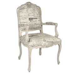 an old chair with writing on the back and arm rests against a white background,