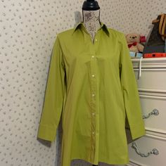 Hip Pockets Hemline Side Slits 3 Button Cuffs 97% Cotton 3% Spandex Length Approximately 31.5” Color: Chartreuse Machine Wash Stretch Button-up Shirt, Green Blouse With Button Cuffs And Spread Collar, Stretch Shirt With Button Closure For Spring, Green Blouse With Button Cuffs For Daywear, Classic Green Blouse For Daywear, Green Blouse With Button Closure And Spread Collar, Green Shirt With Button Cuffs For Daywear, Green Button-up Office Shirt, Green Blouse With Placket