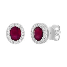 Indulge your inner diva with our exquisite 14K Gold earrings featuring oval diamonds and vibrant colored stones. Exuding elegance and radiance, these earrings are the epitome of luxury, available in Ruby, Emerald, and Sapphire, each encircled by a halo of sparkling diamonds with a combined weight of 0.72ct in gemstones and 0.12ct in diamonds. Let the glamour commence with these classic and stunning earrings. Details: Gemstones: Natural Ruby, Emerald or Blue Sapphire Total Weight 0.72ct and Natur Luxury Oval Diamond Earrings With Gemstones, Formal Oval Diamond Earrings With Gemstones, Oval Diamond Earrings With Gemstone, Oval Ruby Earrings With Halo Design, Oval Diamond Halo Earrings, Oval Pave Set Fine Jewelry Earrings, Oval Pave Setting Earrings In Fine Jewelry, Oval White Gold Earrings With Pavé Setting, Oval Diamond Earrings With Pave Setting