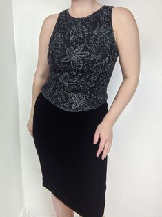 "Vintage 80s deadstock beaded floral sleevless top by Laurence Kazar. Absolutely stunning top with intricately beaded design. Has a fitted bodice and zips up the back. There is one small spot along the bottom hem missing a couple beads, but that's the only flaw. The tag also has replacement beads attached. Would best fit women's small/petite medium. Model is 5'3 size S/M (27in waist & 34/36C). This fit me pretty perfectly. Please see measurements for details. PM me if you have any questions.  MEASUREMENTS:  CHEST - 16in  LENGTH - 19in approx.  Please note, all items listed on my shop are considered vintage (20+ years old). These items have been previously loved and therefore will have normal amounts of wear and tear. Any major flaws will be noted in the item description and photographed. B Sleevless Top, Faux Leather Top, Stunning Tops, Tiered Maxi Skirt, High Waisted Pencil Skirt, Fitted Bodice, Womens Clothing Tops, Sleeveless Top, Blouses For Women