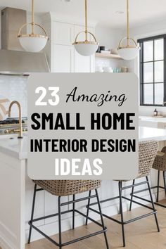 an open kitchen and dining area with white walls, wooden flooring and gold pendant lights