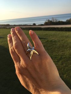 A  comfortable sterling  silver  Starfish ring made by hand .  You can wear it everyday , a special design for those who loves the sea and the seashells .  The length of the Starfish is approximately 3 cm ( 1.18 inch) The jewelry is coming with a free packaging Ocean-inspired Sterling Silver Jewelry With Starfish Charm, Ocean-inspired Sterling Silver Starfish Jewelry, Unique Starfish Charm Jewelry As Gift, Unique Jewelry With Starfish Charm As Gift, Silver Starfish Charm Jewelry For Summer, Silver Jewelry With Starfish Charm For Summer, Unique Star-shaped Sterling Silver Jewelry, Unique Sterling Silver Star Jewelry, Ocean-inspired Silver Star Jewelry