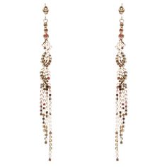 These unique crystal earrings are a fabulous choice for any classic or modern bride, featuring a lovely beautiful design. These will add the perfect amount of sparkle to your special day! Earrings have post-back closures for pierced ears. Color: Gold, Clear Material: Crystal Rhinestones, Metal Casting, Rhodium Plated Dimensions (Size): Approx. 4.75" Drop x 0.35" W (Post Back Closures) Style: Bridal, Wedding, Prom, Dangle Style, Fashion Lead Free Wedding Jewelry Crystal, Crystal Wedding Jewelry, Jewelry Crystal, Wedding Bridal Jewellery, Drop Dangle Earrings, Metal Casting, Modern Bride, Pierced Ears, Bridal Wedding