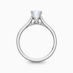 a white gold ring with diamonds on it