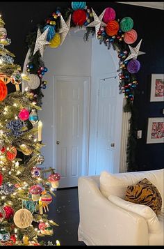 a decorated christmas tree in a living room