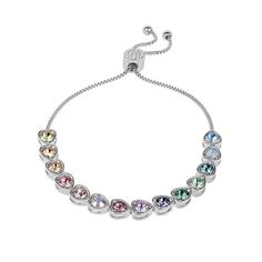 Featuring a rainbow of colorful crystals, this Brilliance bar bracelet delivers vibrant style.PRODUCT FEATURES Length: 10 in. Nickel free Metal: brass Plating: rhodium Finish: polished Packaging: boxed Crystal accents Size: 7/8". Color: Silver Tone. Gender: female. Age Group: adult. Multicolor Cubic Zirconia Crystal Bracelet, Multicolor Crystal Jewelry With Jubilee Bracelet, Multicolor Crystal Jubilee Bracelet, Multicolor Crystal Bracelet With Sparkling Stones, Multicolor Sparkling Stones Crystal Bracelet, Colorful Crystals, Vibrant Style, Bar Bracelet, Bar Bracelets