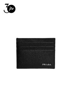 This stylish Prada Card Holder��is the perfect addition to your everyday essentials. The iconic Prada logo plaque is featured prominently on the front face. With six slots for cards as well as one down the middle, there is plenty of storage for all of your needs.���Its small size and neutral color makes this leather card holder perfect to place in your pocket or bag.    Model: 2MC223  Black Vitello Micro Grain Leather  Prada Logo Plaque    Silver-Tone Hardware  6 Card Holder Slots  Middle Slot  M Prada Card Holder, Prada Logo, First Down, Leather Card Holder, Black Card, Card Holder Wallet, Card Holder Leather, Neutral Colors, Everyday Essentials Products