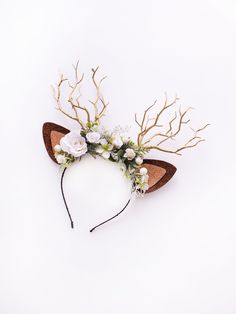 This beautiful white antler headband is a lovely accessory, perfect for a party or photo session. Our stunning faux flowers look like the real. I was inspired by nature and natural color for this antler headband. Also, you are welcome to order custom composition, because I know how it is important to have everything perfect for your important event. Size: Adjustable to fit both kids and adults Materials: faux flowers + Beautiful high-quality materials + 100% handmade + All items will be made to Deer Antler Headband, Blue Floral Crown, Flower Girl Hair Piece, Deer Headband, Boho Wedding Crown, Deer Antlers Headband, Red Flower Crown, Flower Head Wreaths, Reindeer Costume