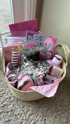 a basket filled with lots of items sitting on top of a carpet