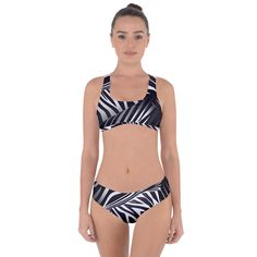 Embrace your wild side with the Zebra Criss Cross Bikini Set by Mila Beachwear. This eye-catching bikini set features a bold zebra print and a unique criss-cross design that adds a touch of modern sophistication to your beach look. Crafted from high-quality, quick-drying fabric, this bikini set ensures exceptional comfort and durability. The criss-cross straps provide a secure and stylish fit, while the matching bottoms complete the ensemble with a chic, cohesive appearance. Enhance your swimwear collection with the Zebra Criss Cross Bikini Set by Mila Beachwear. Perfect for the adventurous beachgoer who loves to combine daring fashion with practical comfort. Chic Cross-tied Swimwear For Beach, Summer Adjustable Cross-tied Swimwear, Crisscross Swimwear With Built-in Bra For Beach, Beach Season Cross-tied Swimwear, Crisscross Stretch Cross-tied Swimwear, High Neck One Piece, Cami Shirt, Cotton Crop Top, Swimsuits Halter