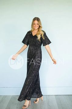 Daphne Black Sequin Dress - DM Exclusive Quality online women’s modest clothing & accessories boutique. Everything you need at unbeatable prices. Modest dresses Modest bridesmaid dresses, modest missionary dresses, mother of the bride dresses Modest swim designs. One pieces, tankinis, midkinis, and more! Black Sequined Full-length Dress, Black Sequined Full Length Dress, Black Floor-length Sequin Fabric For Wedding, Black Sequin Maxi Dress For Party Season, Black Maxi Dress With Contrast Sequin For Night Out, Black Sequin Fabric For Gala And Party Season, Black Floor-length Sequin Dress With Contrast Sequin, Fitted Black Maxi Dress With Contrast Sequin, Black Fitted Maxi Dress With Contrast Sequin