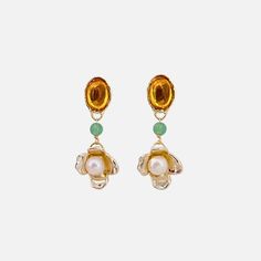 With playful colors, Jade, and hand-carved flowers, these Amber Earrings by Anita Berisha are lightweight and can be worn day to night. Materials: Cultured Freshwater Pearls, Glass Stones, Jade Beads, 12k Gold Fill, High Polished Brass with 14k Gold Plate. Measures: 2.25" Handmade in New York, USA Elegant Yellow Dangle Flower Earrings, Gold Flower-shaped Beaded Earrings, Elegant Gold Flower-shaped Beaded Earrings, Elegant Gold Flower Beaded Earrings, Elegant Yellow Flower Shaped Earrings, Elegant Yellow Flower-shaped Earrings, Elegant Orange Flower Earrings, Yellow Jewelry With 3d Flower Details, Yellow Flower Drop Earrings For Wedding