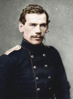 an old photo of a man in uniform