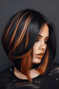 This look combines the rich, deep tones of black hair with the vibrant, fiery hues of copper, creating a multidimensional effect that is both bold and elegant. Color Block Hair Black, Two Tones Hairstyles, Black Hair With Copper, Black Hair Orange Highlights, Black Hair Copper Highlights, Black Orange Hair, Red And Black Hair Color Ideas, Orange Highlights In Black Hair, Black Bob With Highlights