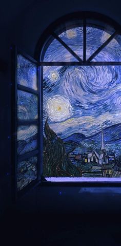 an open window with the starry night painting on it's glass and lit up by blue lights