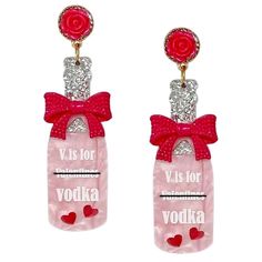 Vodka Bottle Earrings: Spice Up Your Outfit With These Stunning Earrings. These Earrings Feature Pink Vodka Bottles With A Catchy Slogan: “V Is For Valentine’s Vodka”. The Bottles Are Decorated With Red Hearts, Roses, And Bows For A Sweet Touch. The Earrings Have A Glittery Dazzling Effect And Are Ideal For A Night Out With Your Loved One Or A Party With Your Friends. Size: 3" Length, 0.95" Width Tags: #Valentinesvodka, #Pinkvodkabottle, #Vodkalover, #Roseandbow, #Funandfestive, #Alcoholjewelry, Single Earring For Valentine's Day Party, Valentine's Day Celebration Dangle Earrings, Pink Earrings For Valentine's Day Celebration, White Earrings For Valentine's Day Party, Personalized Silver Party Earrings, Personalized Drop Earrings For Parties, Personalized Silver Earrings For Party, Personalized Earrings For Valentine's Day Party, Trendy Valentine's Day Party Earrings