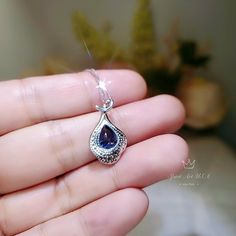 "Full 925 silver Tanzanite necklace decorated with CZ stone Tanzanite jewelry ◆◆Pendant Holder (bezel & Bail) : High Quality 925 Sterling Silver Main Stone:7*9mm Created Tanzanite Whole Pendant Size ( include bail) : 16mm Accent Stone : Cubic Zirconia ◆◆ Necklace chain : Platinum coated 925 sterling silver Box Chain from 16\" to 20\" The model wearing the default size with 18\". Please pay attention to the size Some photos have been enlarged to show details. And others need to minimize for f Elegant Teardrop Birthstone Drop Necklace, Elegant Teardrop Sterling Silver Necklace, Pear Shaped Sapphire Necklace For Gift, Pear Shaped Sapphire Necklace As Gift, Pear-shaped Sapphire Necklace Gift, Elegant Handmade Teardrop Drop Necklace, Silver Tanzanite Teardrop Jewelry, Elegant 925 Stamped Teardrop Pendant Jewelry, Elegant 925 Stamped Teardrop Pendant