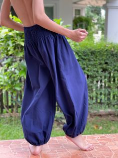 "Thai Cotton Genie Pants, Super comfortable, high rise, smocked waist, wide elastic band, harem/Genie, casual, Aladdin Trouser, Hippie Pants, Detail & Measurement : * Fabric: 100% Cotton * 1 sides open pockets * Waist (elastic waist): 24-40\" * Hips up to 52\" * Inseam : 23\" * Length : 35\" * Around Ankle (with elastic): 14\"-22\" ♥ PAYMENT We accept payments via PayPal only. ♥ Shipping : - All items will be shipped within 1 business day after received payment. We ship items via DHL Express. ♥ Pantalon Thai, Bohemian Clothes Women, Genie Pants, Maxi Pants, Yoga Trousers, Pants Comfy, Hippie Pants, Rayon Pants, Boho Pants