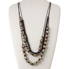 This three-strand necklace features black rounds and plastic gold nugget beads in varying sizes. The overall necklace length measures 42 inches. Ready-to-wear necklace is ideal for gift-giving, counter sales or extending current jewelry lines. Colors, shapes and sizes may vary in each lot. Adjustable Long Necklace With Black Beads, Adjustable Multi-strand Brass Necklace, Adjustable Black Brass Necklaces, Adjustable Double Strand Metal Layered Necklace, Adjustable Gold Beaded Necklace Nickel Free, Adjustable Gold Beaded Necklaces Nickel Free, Adjustable Gold Nickel-free Beaded Necklace, Adjustable Multi-strand Metal Beaded Necklace, Adjustable Multi-strand Nickel-free Necklaces