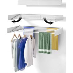 a white shelf with clothes hanging from it's sides and an arrow pointing to the right