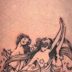 two women with stars and ribbons on their thighs, one is holding the other's arm