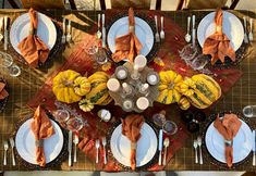 an overhead view of a table set for thanksgiving dinner