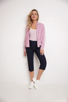 Do you sometimes wish you could enjoy the summers in a casual look, but think it may not be dressy enough for the office? These dressy straight leg capris are made just for you. They are roomy and comfortable enough to feel the soft breezes, and elegant enough to pair up with all your formal tops. Their chic details such as the pressed leg and nautical-inspired buttons add flair to your outfits, making them a summer must-have. Contoured waistband and back darts for perfect fit Tonal buttons at t Casual Capri Outfits, Summer Workwear Pants With Cropped Leg, Summer Workwear Cropped Leg Pants, Casual Workwear Capri Pants, Casual Capri Length Pants For Work, Casual Capri Length Work Pants, Trendy Summer Cropped Leg Capris, Casual Linen Ankle-length Capris, Casual Bottoms For Spring With Straight Hem