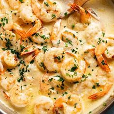 a skillet filled with shrimp and cheese