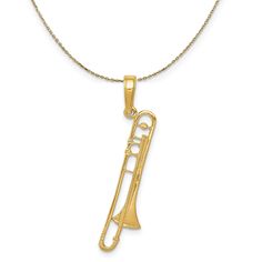 a gold necklace with a musical instrument on it