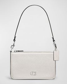 Coach pouch shoulder bag in crossgrain leather and signature coated canvas     Detachable shoulder strap with logo tag, 15.8"L    Zip top closure     Interior, one slip pocket and one card slot     Lining: Cotton    Approx. 4.8"H x 7.8"W x 1.88"D    Item Weight (Lbs.): 0.7    Spot clean    Imported Coach Pouch, Good For Me, Thank You God, Logo Tag, Now And Forever, Leather Pouch, Black Bag, All Things Beauty, Zip Top