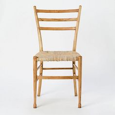 a wooden chair with a roped seat and backrest on a plain white background