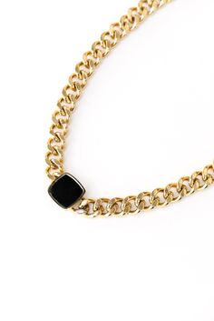 The Onyx Necklace effortlessly enhances your ensemble and adds a sense of allure.The deep black hue of the onyx stone creates a striking contrast against the radiant gold or silver, adding a touch of drama to your look. Pair it with the Onyx Ring or Onyx Bracelet for a full look Materials: Titanium Steel, 14k-Gold Filled, Details: 17 inch length, 1 cm link size Luxury Black Chain Necklace, Luxury Black Jewelry With Chain Detail, Luxury Black Jewelry With Chain, Modern Black Chain Necklace For Formal Occasions, Black Luxury Metal Chain Necklace, Luxury Black Metal Chain Necklace, Modern Black Formal Chain Necklace, Modern Gold Necklace With Black Enamel, Gold Onyx Jewelry With Black Enamel