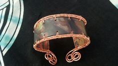 This lovely cuff bracelet has a Celtic flair. It is flexible to fit any wrist. Can be worn with swirls on top for a more elegant look or with solid side up for a more casual look. Each one is custom made so colors in main copper piece will vary slightly from photo. Copper Jewellery, Copper Cuff Bracelet, Copper Sheets, Copper Cuff, Stone Wrapping, Copper Bracelet, Phoenix Az, Metal Jewelry, Cuff Bracelet