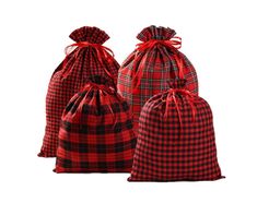 three red and black checkered bags with ties on the sides, one is empty