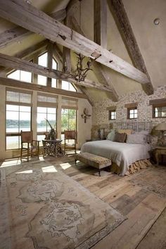 an image of a bedroom with wood floors and stone walls, which is featured on instagram