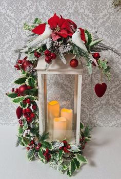 a white lantern with red and green decorations